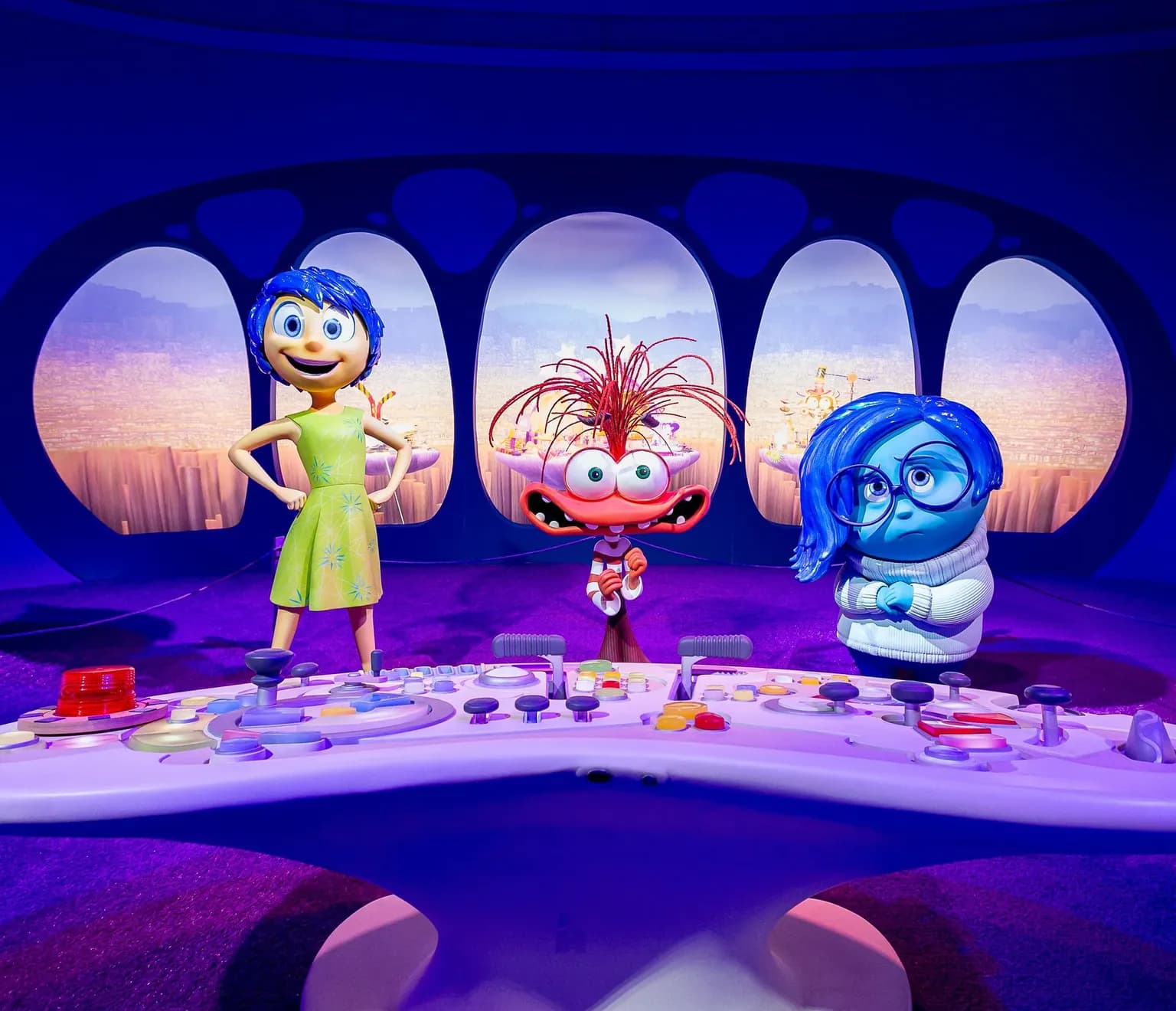 Characters from Inside Out Standing in Room